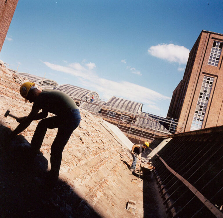 Workers renovating the Bracco SPIN site in Torviscosa, 2002